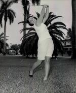 Student Barbara Kelley practicing golf swing